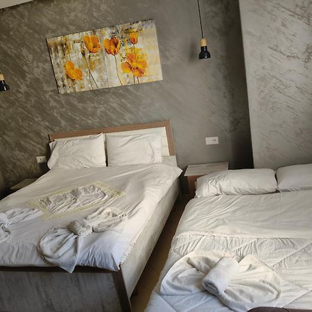 Ajilin Hotel Rooms Корча Номер фото