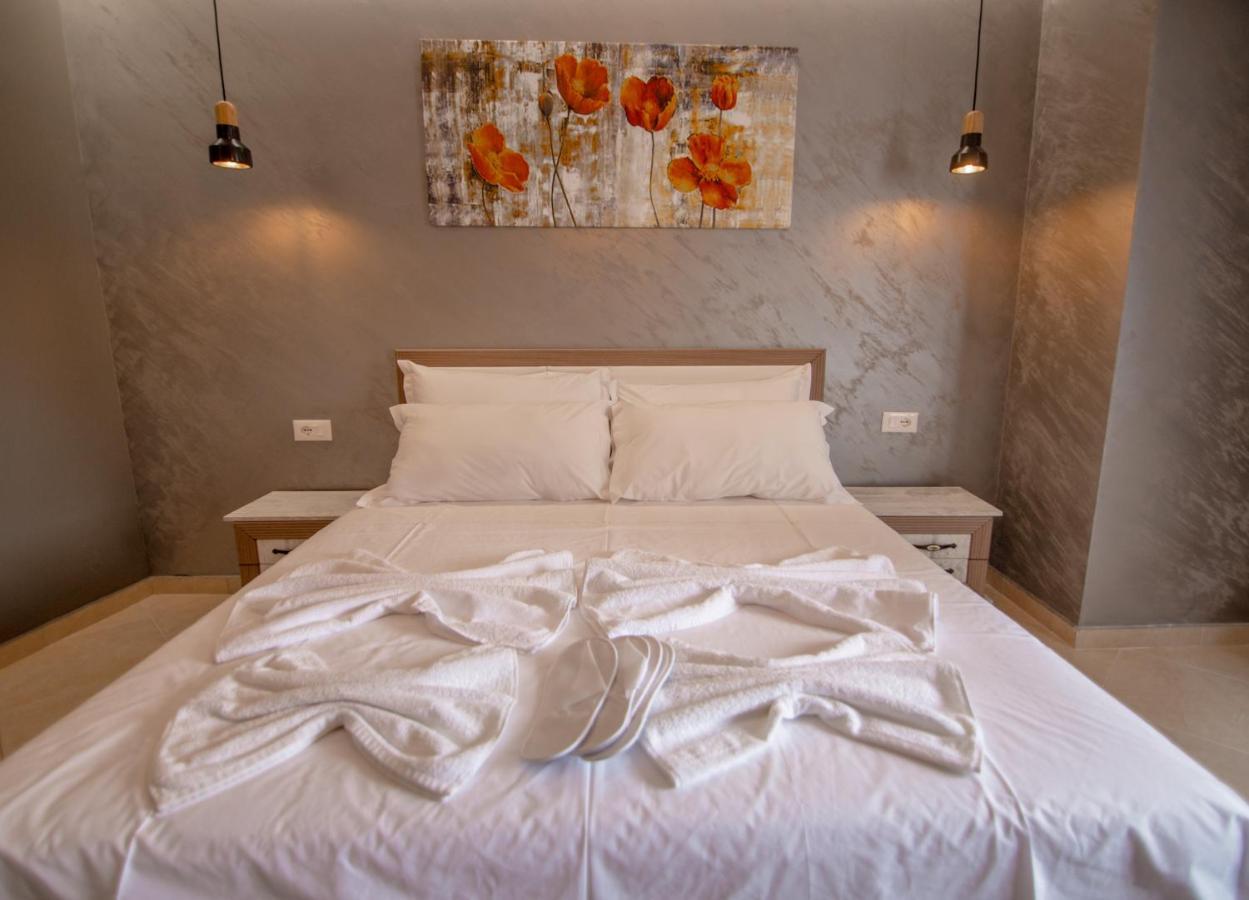 Ajilin Hotel Rooms Корча Екстер'єр фото