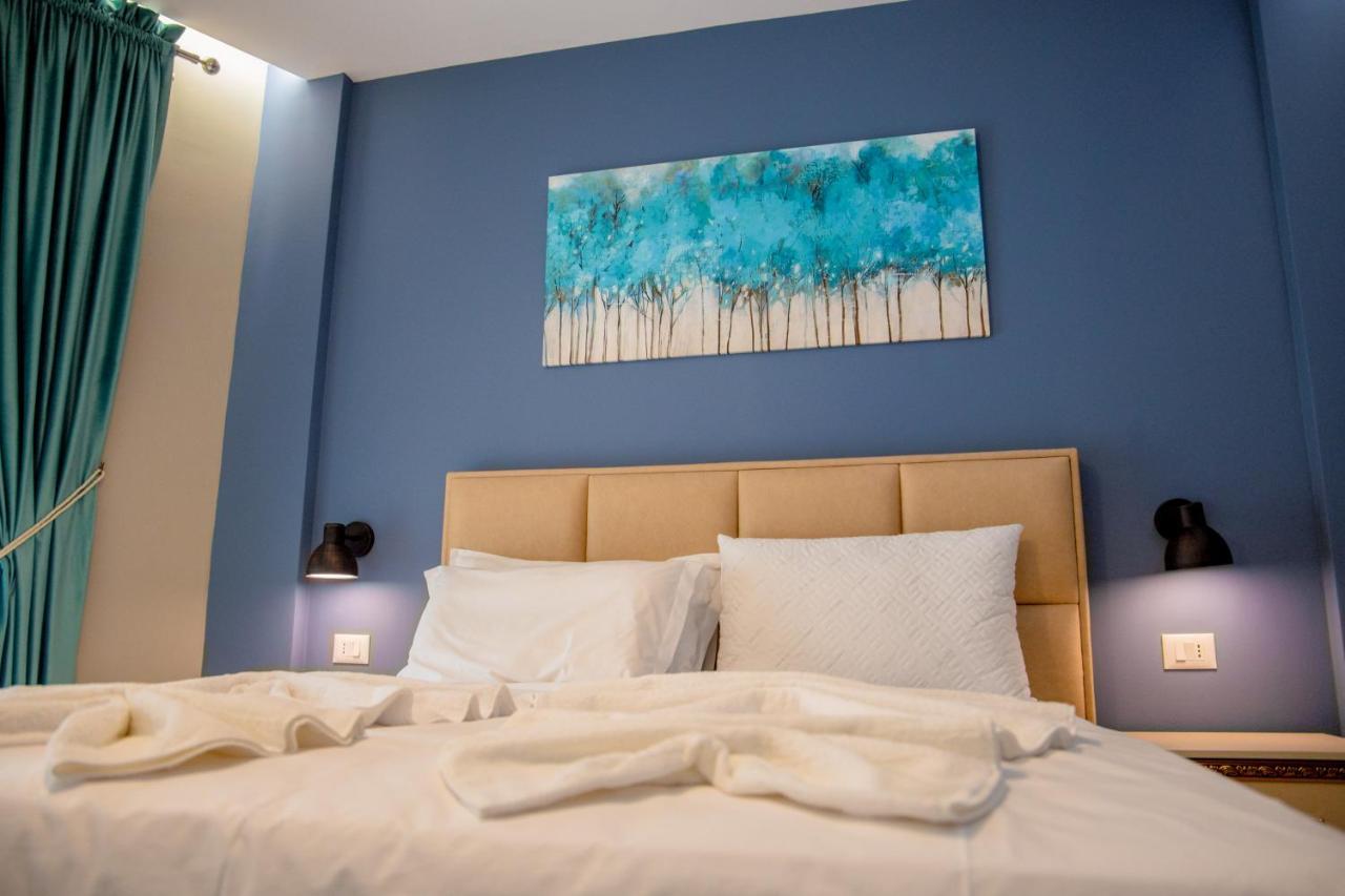 Ajilin Hotel Rooms Корча Екстер'єр фото