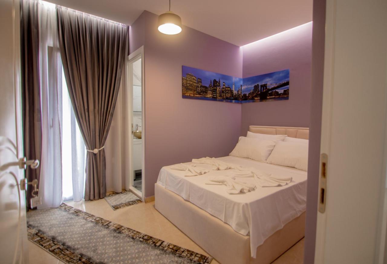 Ajilin Hotel Rooms Корча Екстер'єр фото