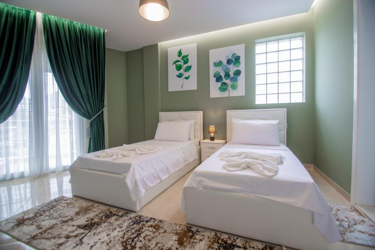 Ajilin Hotel Rooms Корча Екстер'єр фото