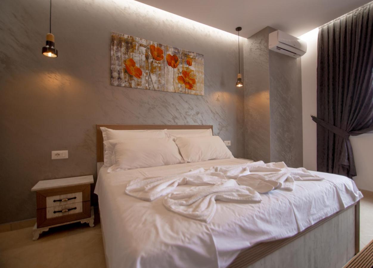 Ajilin Hotel Rooms Корча Екстер'єр фото