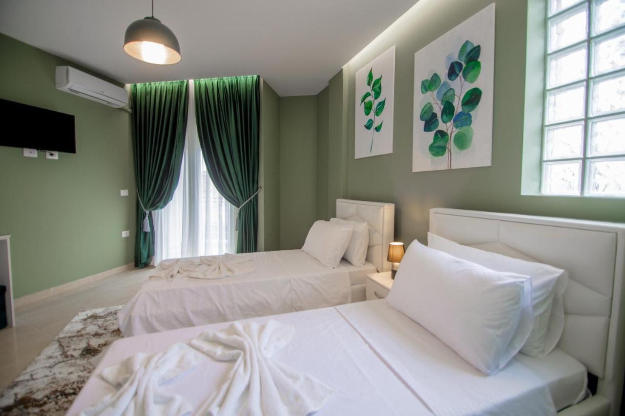 Ajilin Hotel Rooms Корча Екстер'єр фото