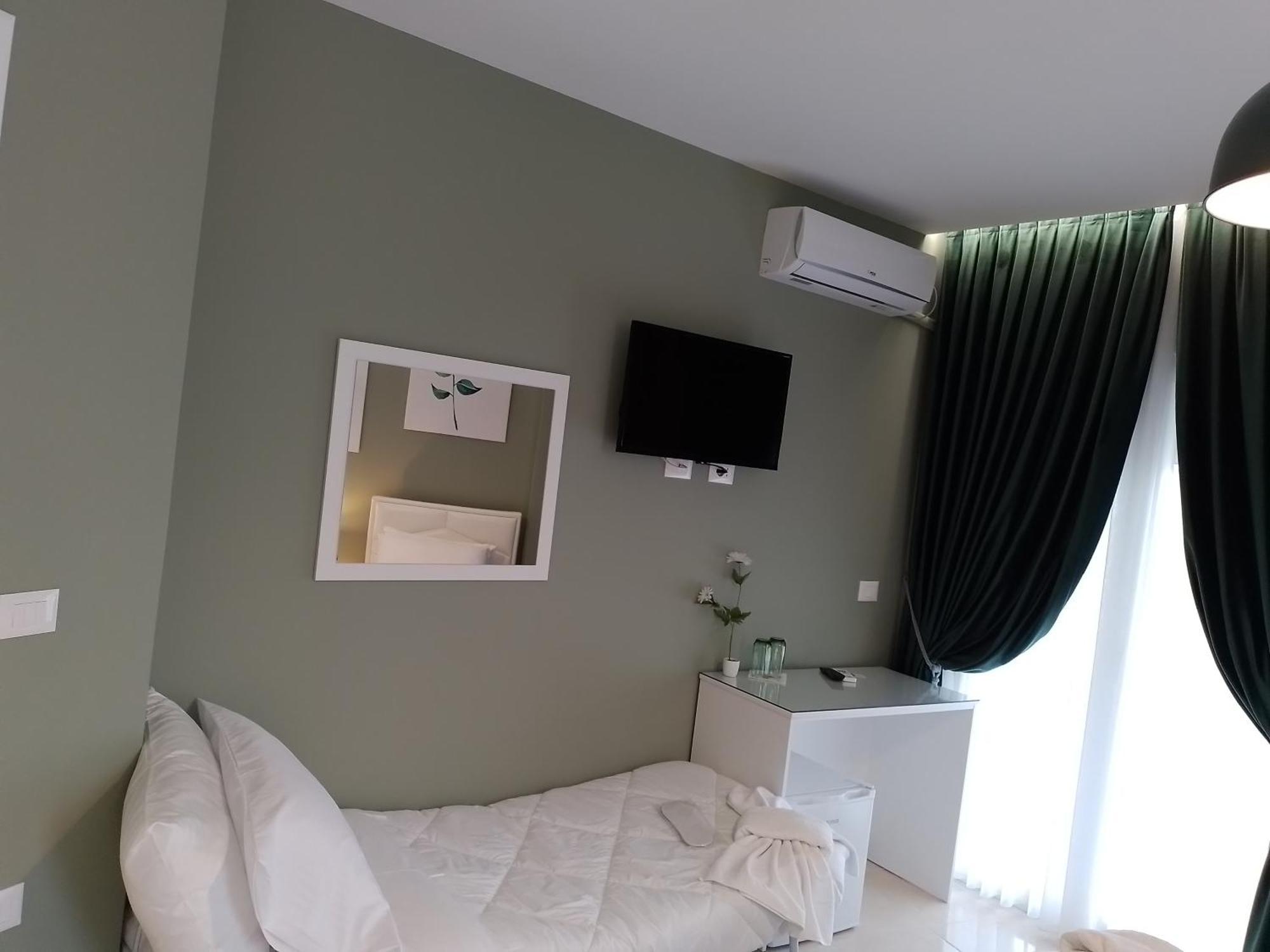 Ajilin Hotel Rooms Корча Номер фото