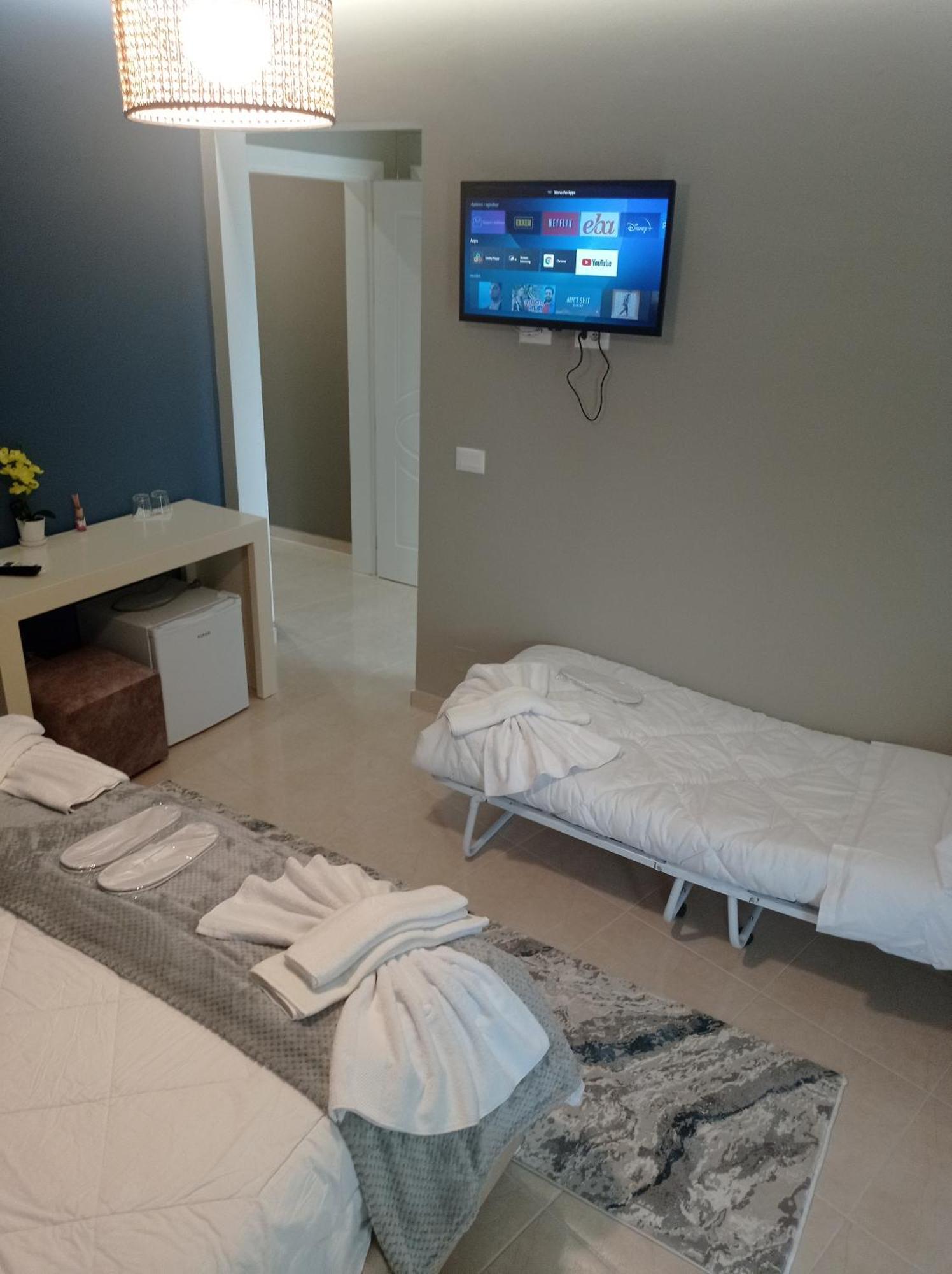 Ajilin Hotel Rooms Корча Номер фото