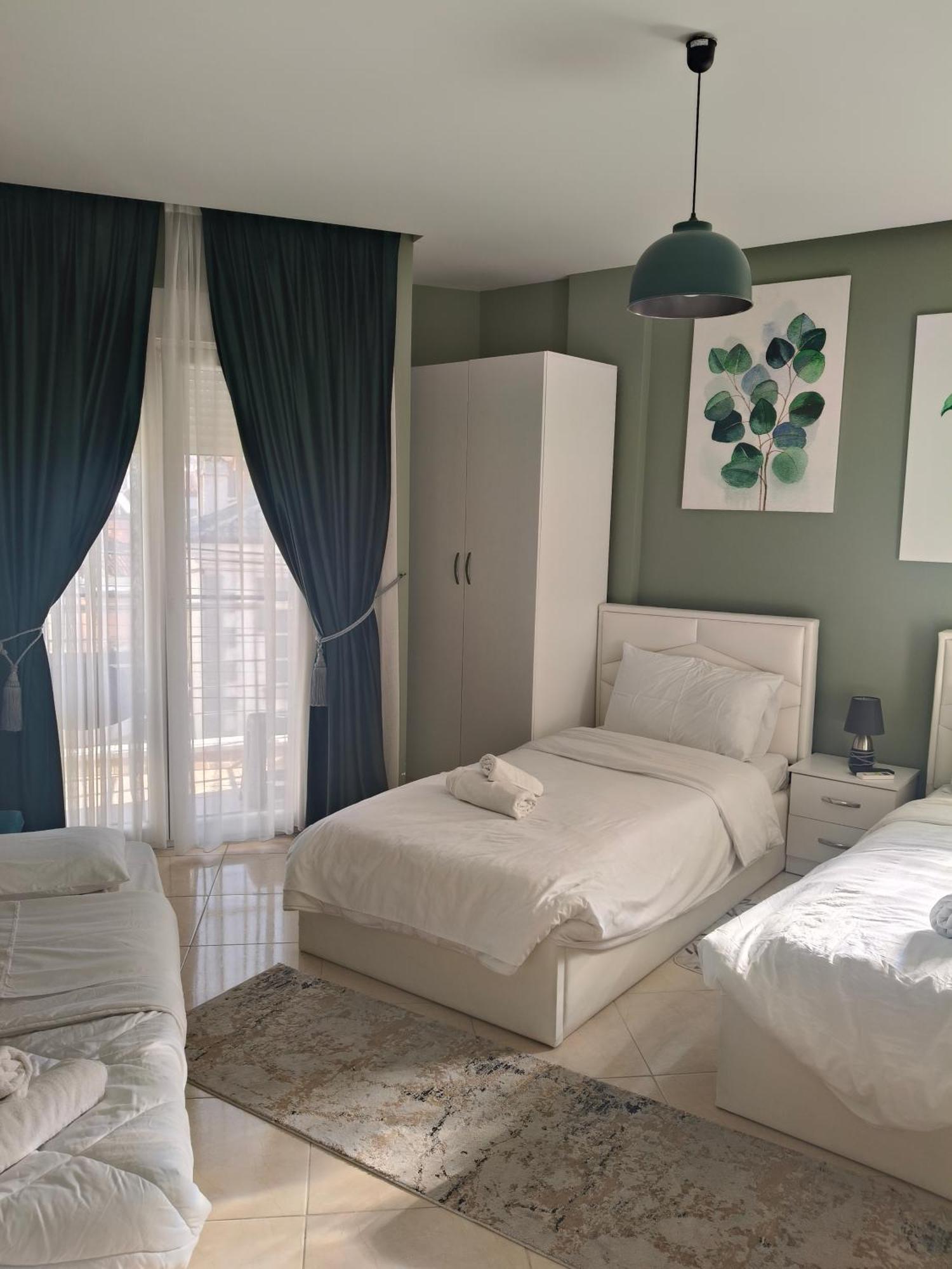 Ajilin Hotel Rooms Корча Номер фото